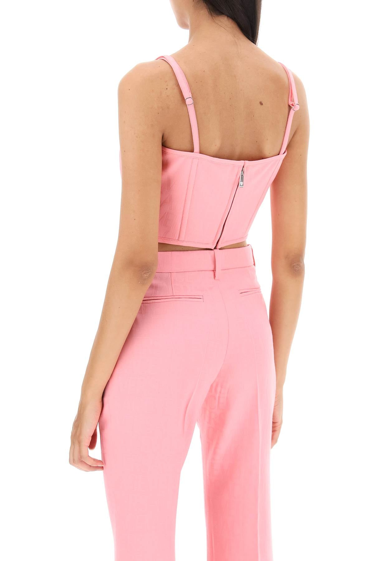 粉色羊毛紧身胸衣，拥有Versace图案和V字形结构