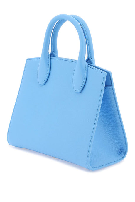 淡蓝色皮革小型手提包，带有标志性的Gancini挂钩图案