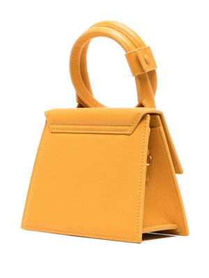 琥珀橙色荔枝纹皮革手提包，配金色五金件