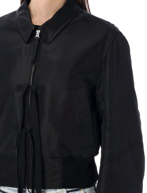 女装尼龙短款西装外套-黑色对比色腰边和袖口设计前拉链蝴蝶结细节