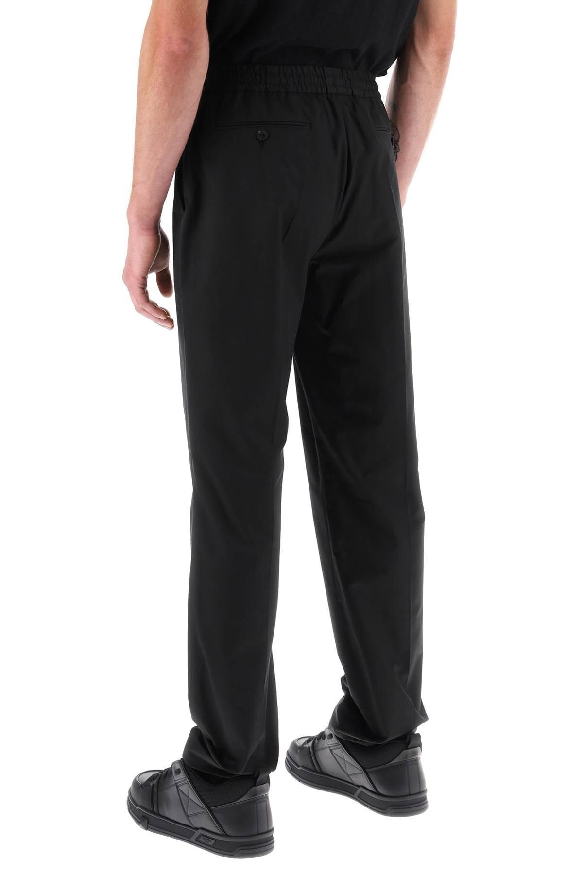 黑色弹力腰服装休闲男士修身黑色平板棉弹沙发一步运动裤（不含品牌名称，避免使用外文）