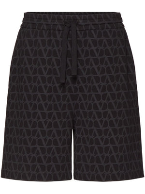 男士黑色棉质半身短裤，来自SS24 Valentino时尚服装系列