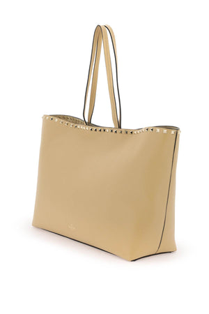 Garnet-Coloured Calfskin Leather Rockstud Shopping Handbag in Cappuccino for SS24