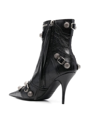 BALENCIAGA Women's Black Pointed Toe Ankle Boots with Stud, Tassel, and Zip Detailing