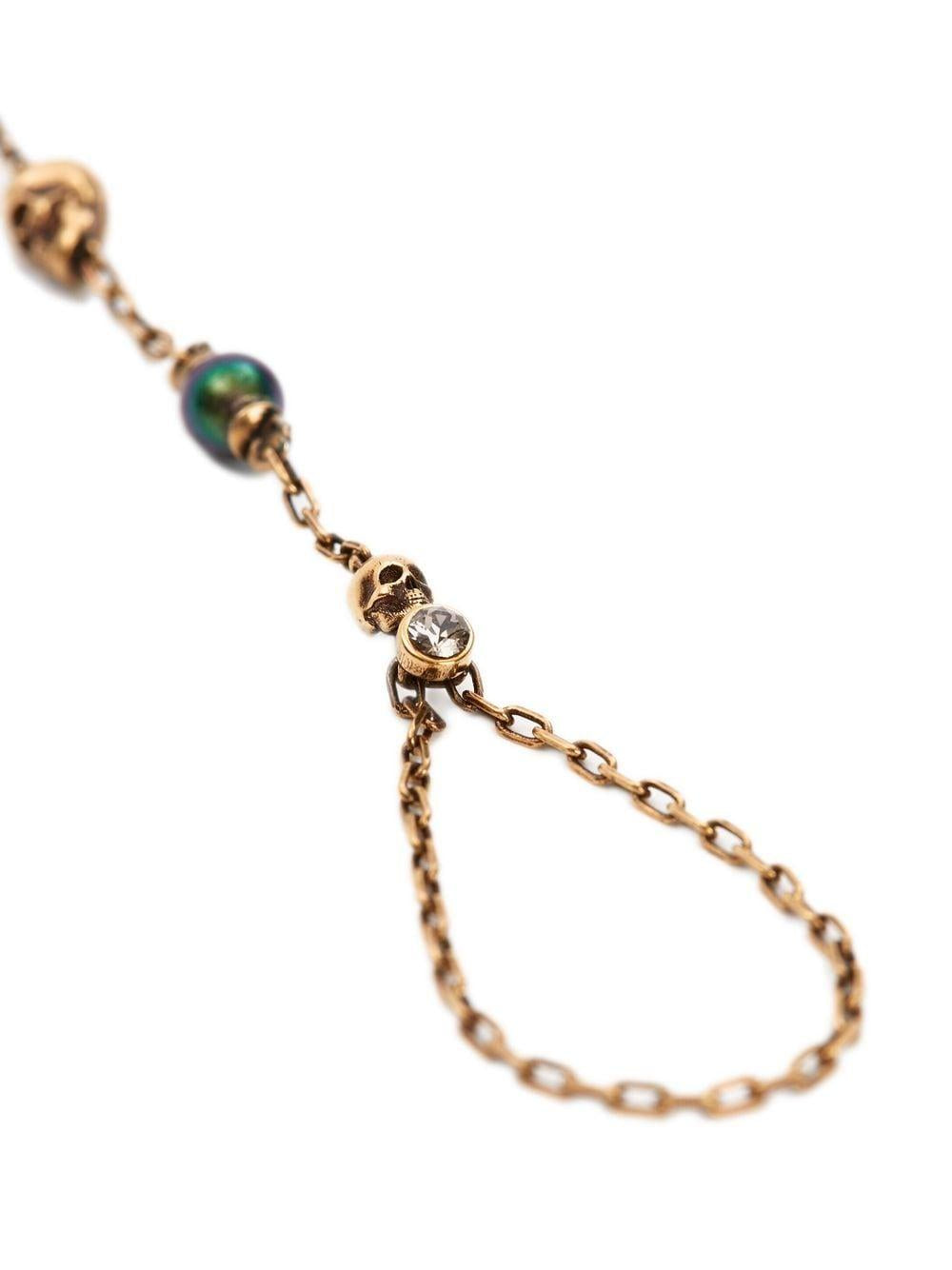 ALEXANDER MCQUEEN Antique Gold Pearl Skull Bracelet for Women