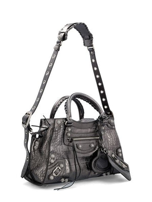 BALENCIAGA Elegant Embossed Metallic Handbag for the Modern Fashionista