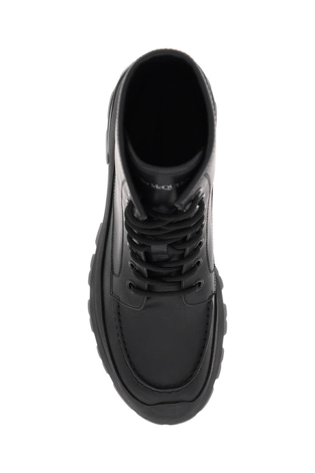 ALEXANDER MCQUEEN Men's Black Leather Ankle Boots with Oversized Sole and Iconic Logo Print