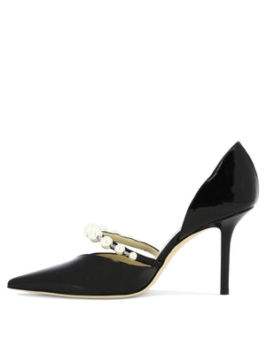 JIMMY CHOO Black Patent Leather Pumps for the Fashionable Woman