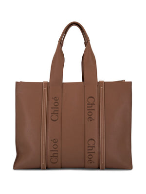 CHLOÉ Woody Large Brown Leather Tote with Suede Lining and Logo Tape Detail