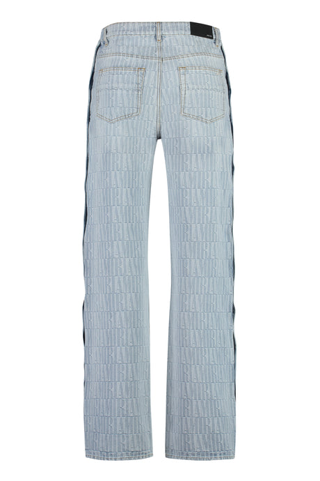 AMIRI Men's Blue Snap Button Jeans with Side Slits and Silver Metal Rivets